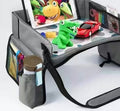 Trekkaboo Travel Tray in Slate Gray with a tablet in the fold-out stand and toys on the play surface